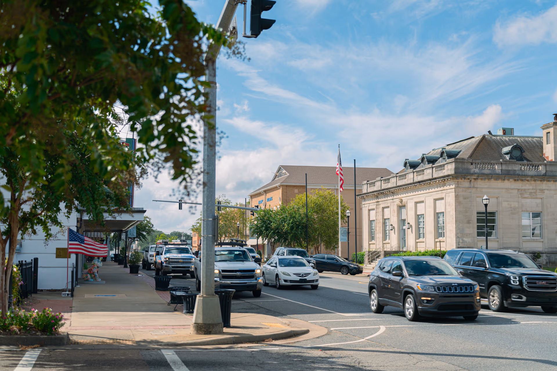 Vehicles moving through a downtown Ruston, Louisiana intersection